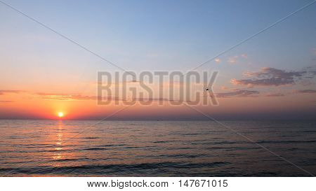 Photo of a beautiful sunrise over the sea. Picture taken on a summer morning in August 2016.