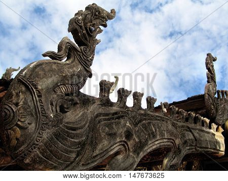Naga's roof terrace in  "Wat Phra That Lampang Luang" and clouds filled the sky.