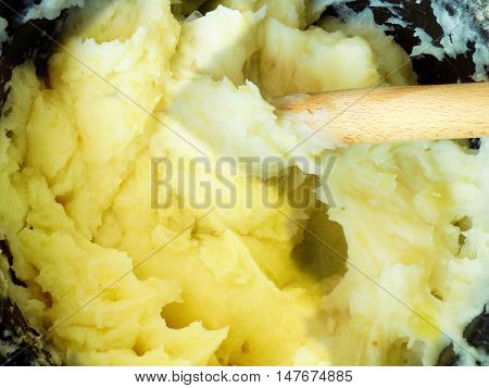 Potato creamy puree mash food in cooking pot in kitchen
