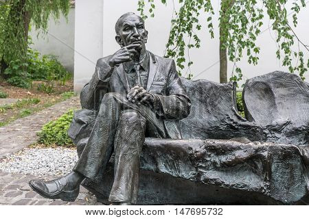 POLAND, KRAKOW - MAY 27, 2016: Statue of polish diplomat Jan Karski in the Kazimierz Jewish district of Krakow. Near to the Remuh Synagogue.