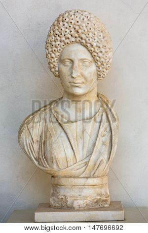 ROME, ITALY - JUNE 12, 2015: Ancient bust of the woman in the baths of Diocletian in Rome. Italy