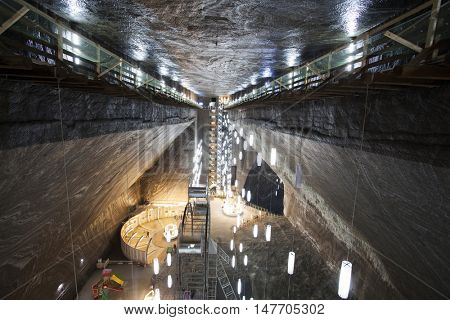 TURDA, ROMANIA - SEPTEMBER 15, 2016. Underground salt mine in Turda ,popular attraction for many tourists,Transylvania, Romania.