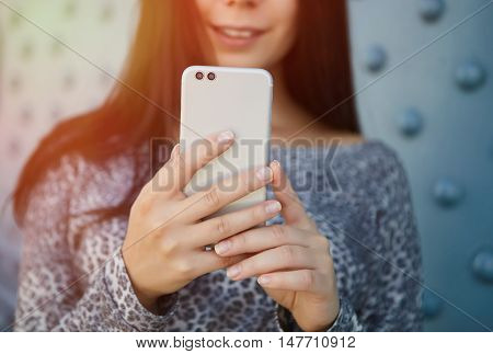Girl Taking Photo With Modern Dual Camera Smart Phone