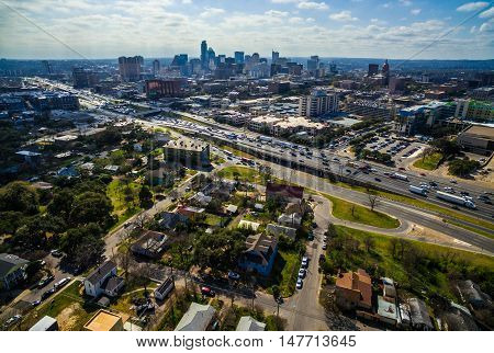 Austin Texas Skyline Cityscape over I-35 industrial Progress Capital Cities Urban Sprawl dramatic Sky on a sunny summer day Over central Texas