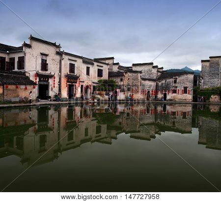 HONGCUN, CHINA - APRIL 20, 2014: Panorama of Moon Lake in Hongcun Village, Anhui Province.