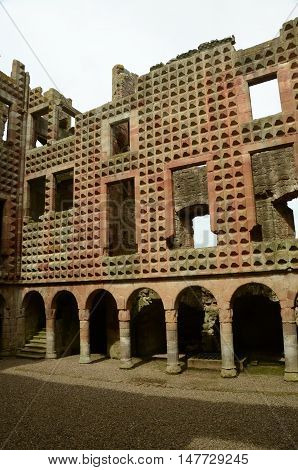 A view of the diamond faceted façade inside Crichton Castle