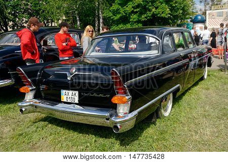 Kharkiv Ukraine - May 22 2016: Soviet retro car black GAZ-13 Chayka manufactured between 1959 and 1981 is presented at the festival of vintage cars Kharkiv Retro Rally - 2016 in Kharkiv Ukraine on May 22 2016