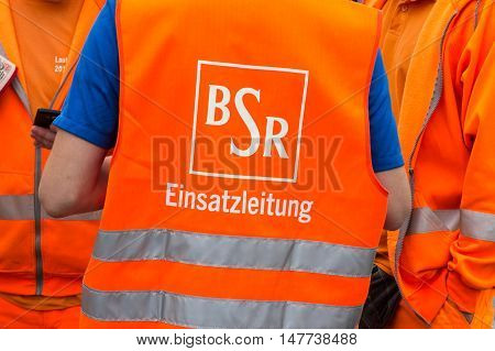 Berlin Germany - September 17 2016: Logo of the Berlin Waste Management and City Cleaning company BSR on worker uniform.