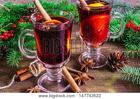 christmas mulled wine with spices pine cones and . hot alcohol drinks
