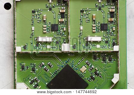 Miniature electronic board with radio components and processor