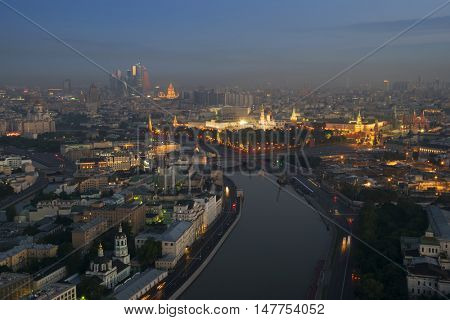 Big Moskvoretsky Bridge, Kremlin with illumination in Moscow, Russia, view from Stalin skyscraper on Kotelnicheskaya quay