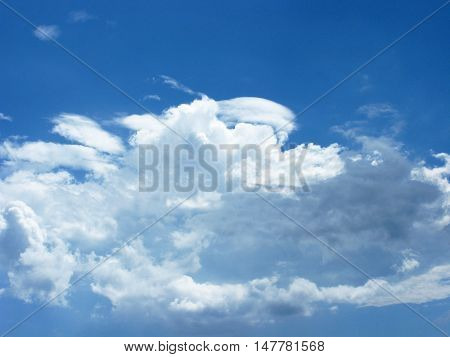 White clouds on blue sky. The clouds in the sky. Sky with clouds. Clouds background. Sky background. Nature.