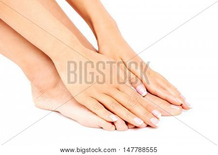 Young woman touching her feet