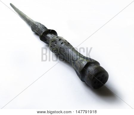 A magic wand with a white background