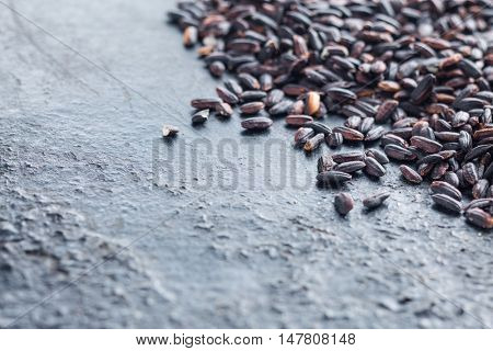 The nerone rice. On old kitchen background.