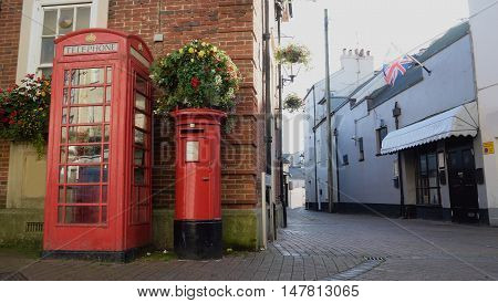 Red public telephone box and letter box in Fore Street Sidmouth