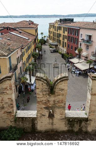 SIRMIONE ITALY - MAY 5, 2016: View of Piazza Catello from the Scaliger Castle in Sirmione Lake Garda Italy