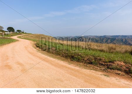 Dirt road on hillside sky rural countryside landscape