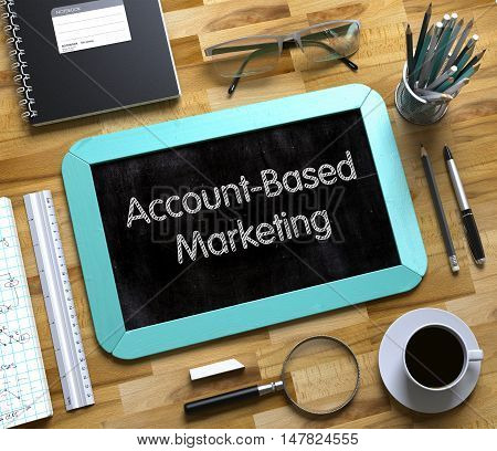 Account-Based Marketing - Text on Small Chalkboard.Account-Based Marketing - Mint Small Chalkboard with Hand Drawn Text and Stationery on Office Desk. Top View. 3d Rendering.