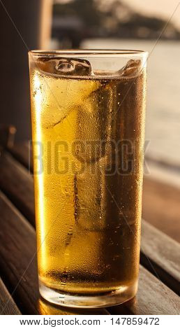 Cold beer in the light of the evening sun.