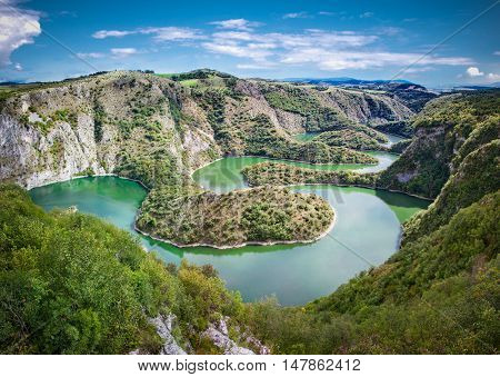Meanders at rocky river Uvac gorge on sunny day, southwest Serbia