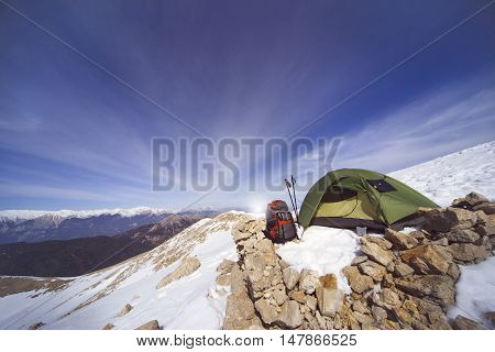 Camping on the top of the mountain in winter.
