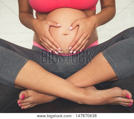 Pregnant Woman Doing Yoga