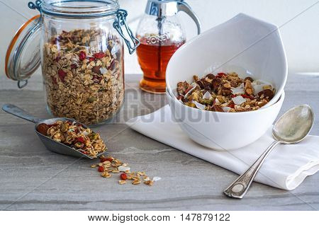 Healthy Coconut Granola with Nuts, Gogi Berry and Honey. Healthy breakfast. Selective focus.