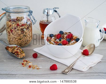 Healthy Coconut Granola with Nuts, Gogi Berry and Berries. Healthy breakfast. Selective focus.