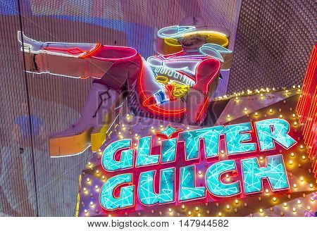 LAS VEGAS - JUNE 18 : Cowgirl neon sign in downtown Las Vegas on June 18 2016. The iconic sign of Glitter Gulch is placed in 20 East Fremont Street in Downtown Las Vegas