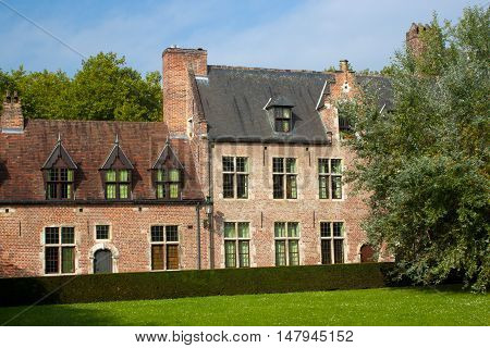 Old historic houses in Grand Beguinage in Leuven. Belgium. Flanders.