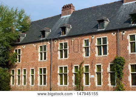 Old historic houses in Grand Beguinage in Leuven. Belgium. Flanders.