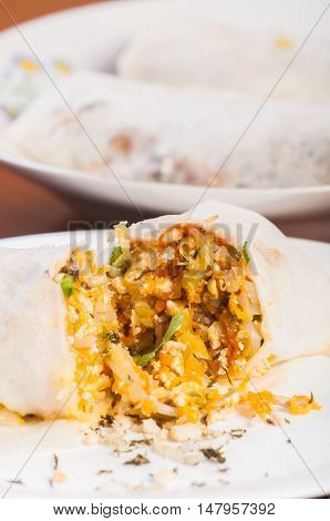 fresh made lumpia or mixed vegetable on a rice wrap