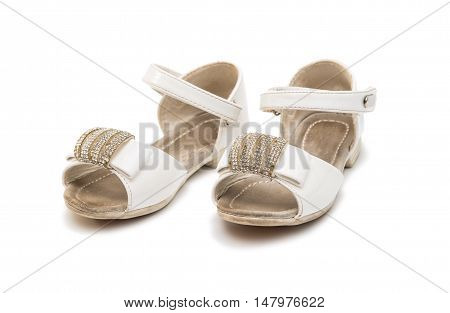 old baby shoes isolated on white background