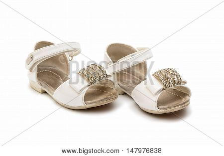 old baby shoes isolated on white background