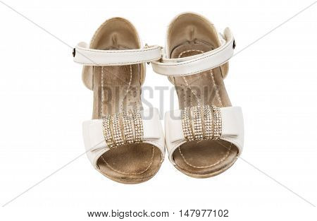old baby shoes isolated on white background