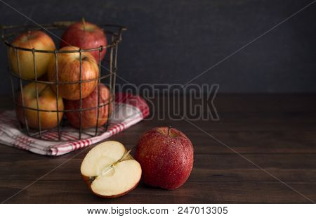 Beautiful Fresh Apples On A Wooden Table