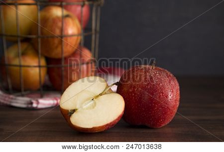 Beautiful Fresh Apples On A Wooden Table