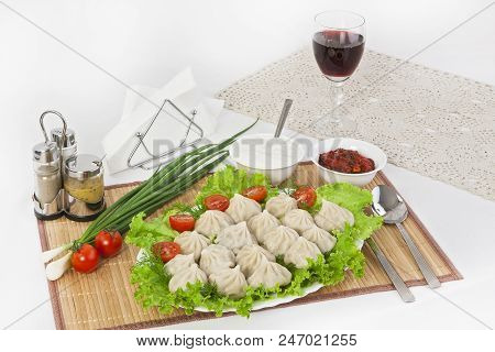 Kinkali In Green With Tomatoes And Onions. Serve With Soy Sauce And Sour Cream.