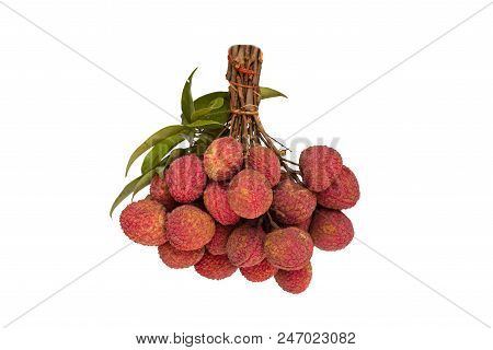 Lychee with green leaves isolated on white background.