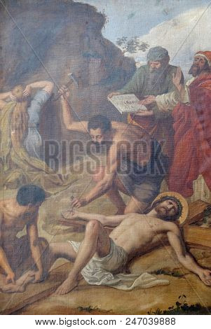 SISAK, CROATIA - DECEMBER 07: 11th Stations of the Cross, Crucifixion: Jesus is nailed to the cross, Church of Visitation of the Virgin Mary in Sisak, Croatia, on December 07, 2017.