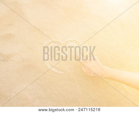 Young Caucasian Woman Image Photo Free Trial Stock Young Caucasian Woman Draws With Hand Heart On Fine White Beach Sand By Ocean