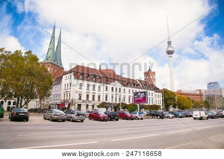 BERLIN, GERMANY-OCT 30, 2016: Spandauer street with Rotes Rathaus and Berlinen Fernsehturn TV tower in Berlin, Germany.