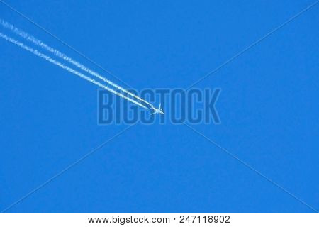 Military Supersonic Russian Fighter Aircraft Flying. Army Plane In The Blue Sky At High Speed.