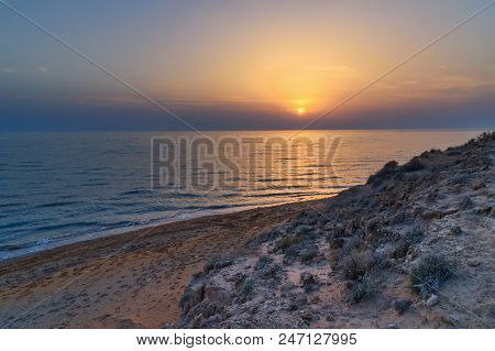 Sunset Over The Sea On Wild Beach Of Persian Gulf Coast. Bushehr Province. Iran