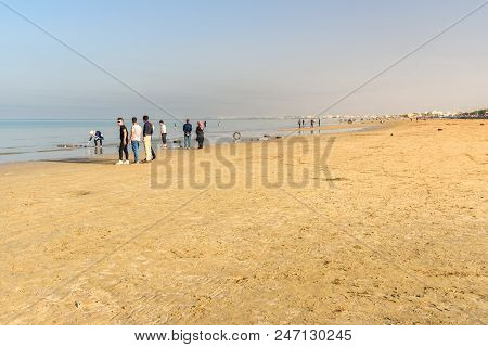 Bandar Ganaveh, Bushehr Province, Iran - March 27, 2018: Iranian People On The City Beach At Persian