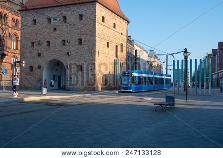 Rostock Germany - April 20. 2018: A Tram Drives By The Steintor City Gate