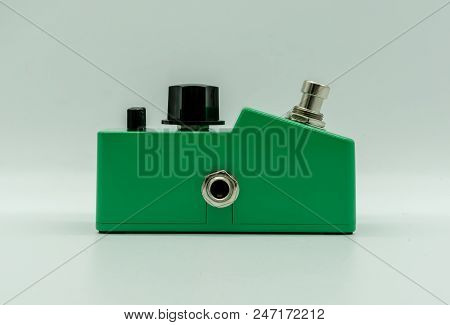 Green Vintage Guitar Pedal Isolated On White Background