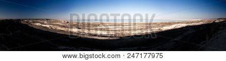 Panorama View To Aral Sea From The Rim Of Plateau Ustyurt Near Aktumsuk Cape At Sunset In Karakalpak