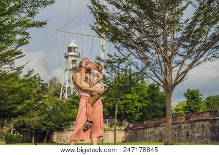Mom And Son On Background Of Fort Cornwallis In Georgetown, Penang, Is A Star Fort Built By The Brit